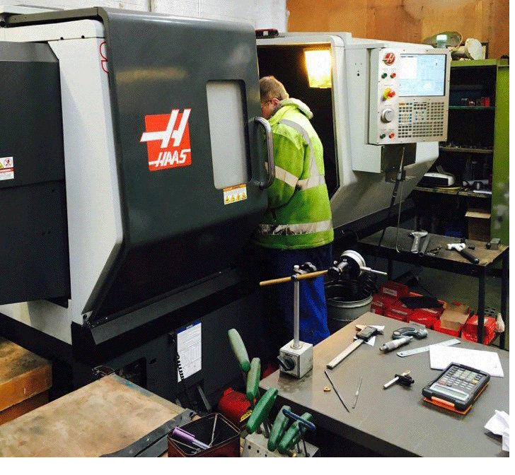 Man operating CNC